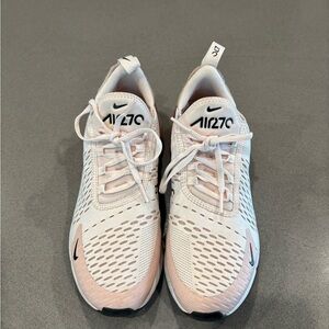 Nike Pink Athletic Shoes with Breathable Mesh and White Laces